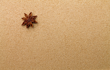 close-up view on amaranth seeds and star anise