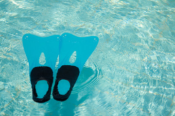 Swimming pool and fins