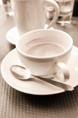 Fototapeta na wymiar wonderful white cup of hot coffee on table