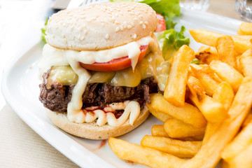 Cheese burger - American cheese burger with fresh salad