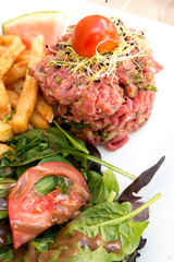 tasty tartare(Raw beef) - classic steak tartare on white plate