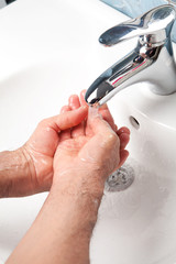 Man washing hands