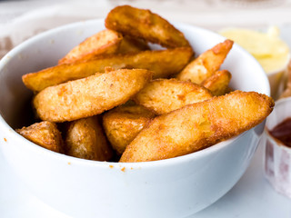 Golden French fries potatoes ready to be eaten