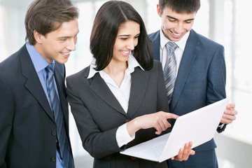 Business people discussing in a office corridor