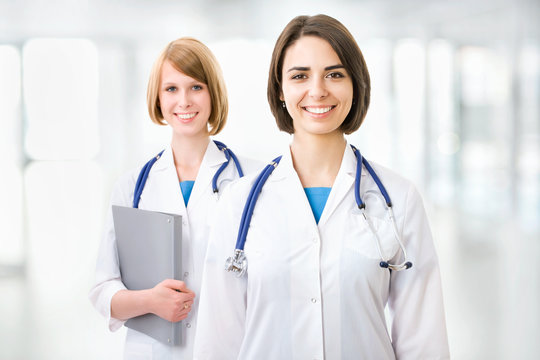Portrait of two successful female doctors