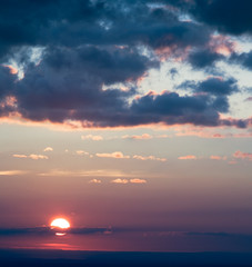 Sun at sunset cloudscape