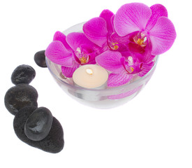 zen stones and orchids with candle