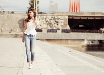 Portrait of a beautiful european woman smiling outdoors