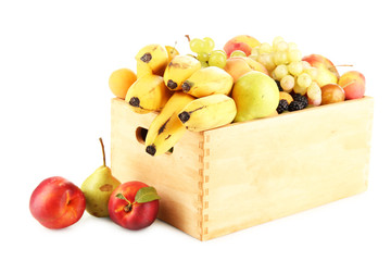 Still life of fruit in a box isolated on white
