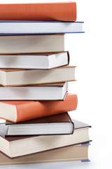A stack of books on a white background.