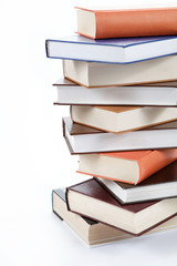 A stack of books on a white background.