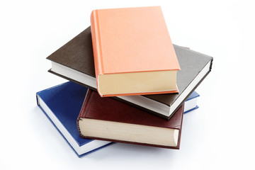 A stack of books on a white background.