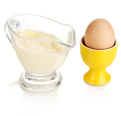 Mayonnaise in bowl isolated on white