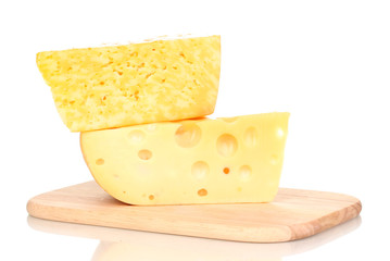 tasty cheese on wooden board isolated on white