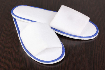 slippers on wooden background