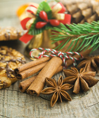 Christmas cakes on brown wooden background (selective focus)