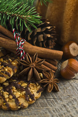 Christmas cakes on brown wooden background (selective focus)