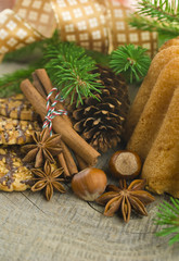 Christmas cakes on brown wooden background (selective focus)