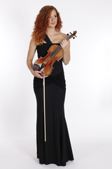 red-haired girl with violin in black dress