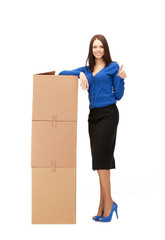 businesswoman with big boxes