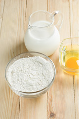 Basic ingredients for dough. Milk, eggs and flour.
