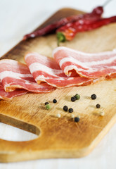 Slices of bacon and pepper