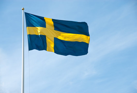 Flag of Sweden in the blue sky