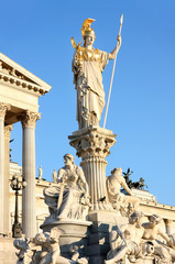 Obraz premium The Austrian Parliament and Athena Fountain in Vienna, Austria
