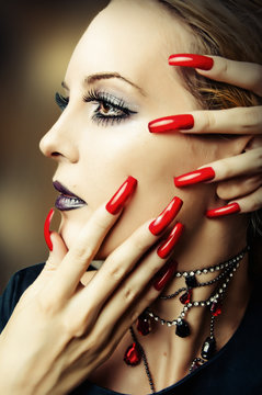 Fashion Make Up And Long Red Nails