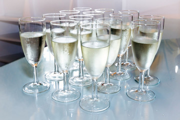 Glasses with champagne on the party table