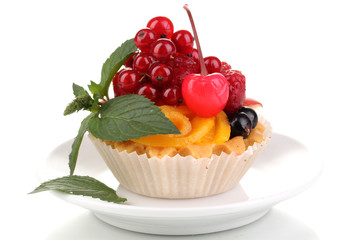 Dulcet cake with fruit and berries isolated on white