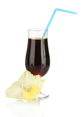 glass with cocktail and gladiolus bud isolated on white