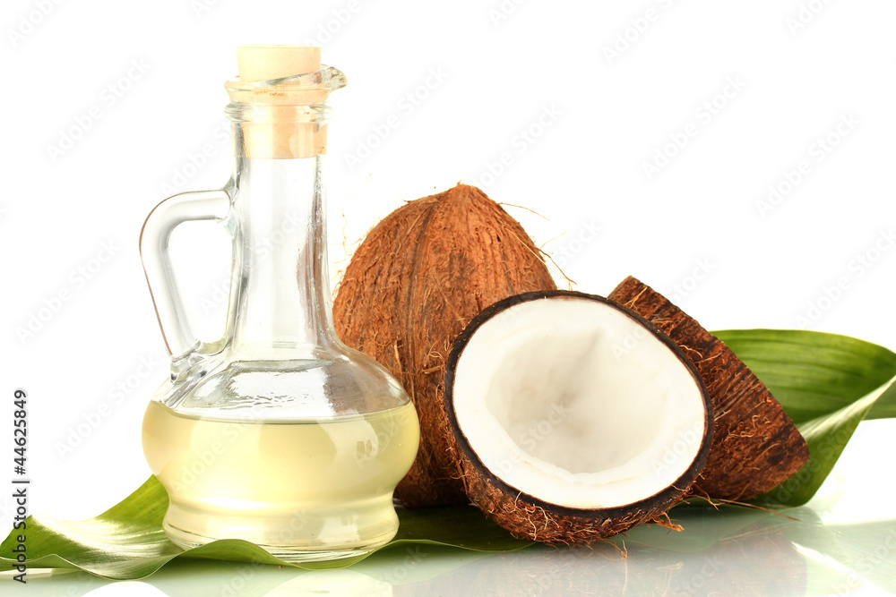 Poster decanter with coconut oil and coconuts isolated on white