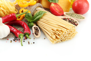 Pasta spaghetti, vegetables and spices, isolated on white