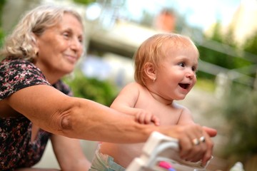 grandmother with baby