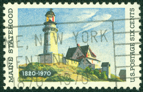 Stamp shows "Lighthouse at two Lights"