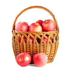 Apples in basket isolated on white background