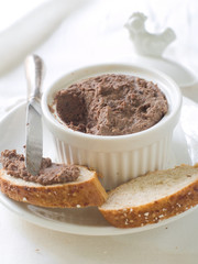 Chicken liver pate in ramekin, selective focus
