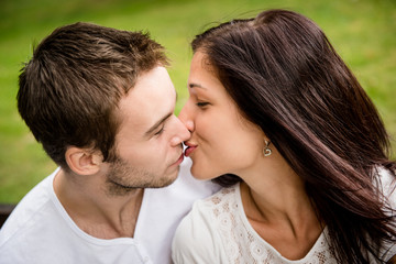 Young kissing couple in love