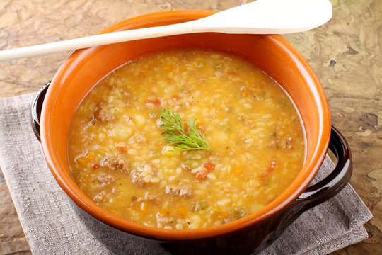 Potato soup with pasta and meatballs