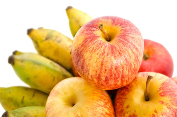 Bunch of cultivated banana and apples