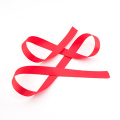 Red ribbon bow isolated on white background