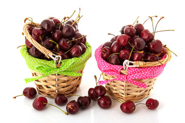 Fototapeta na wymiar Little baskets with cherries