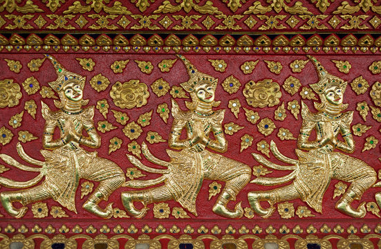 Thai style gloden deva carving on wood