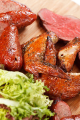 sausages on a wooden cutting board