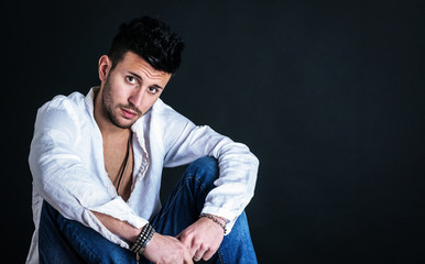 Fashion portrait of a young handsome man