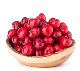 cherry berries in wooden bowl