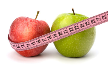 Apple with tape measure. Healthy lifestyle concept.