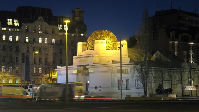 Stream of cars quickly rushes in front of Vienna Secession