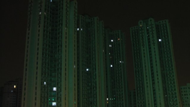 Light in windows switch on and off at night and on sunrise